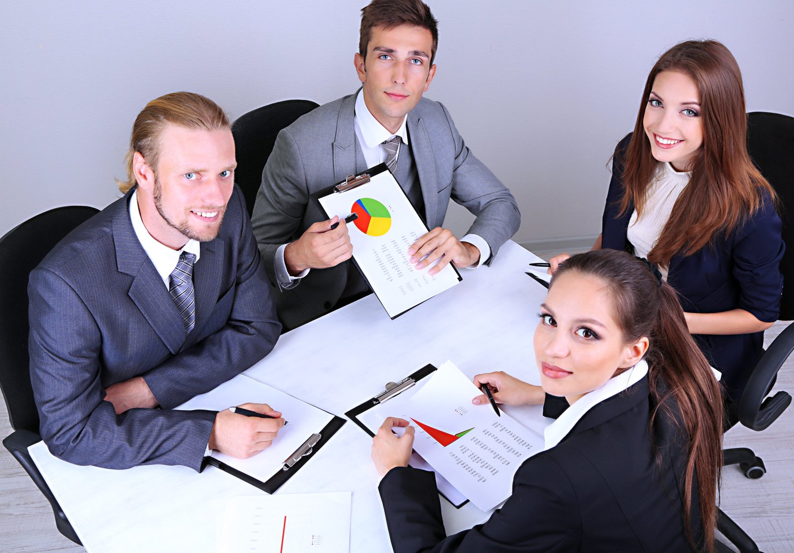 Group of business people having meeting together